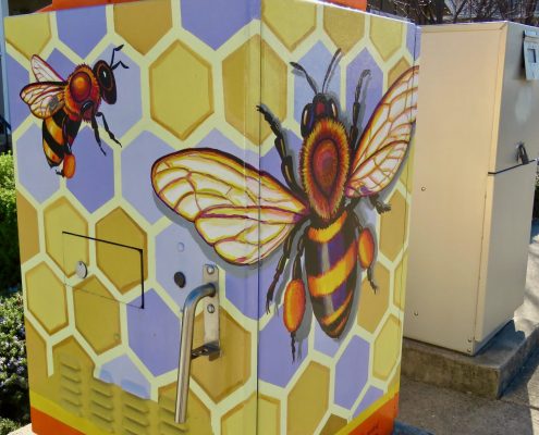utility box with painting of bees